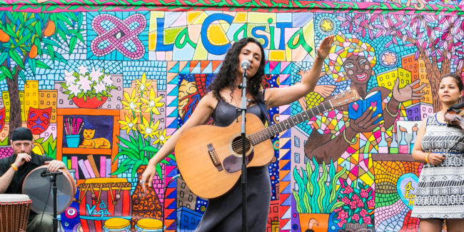2019 Block Party - Women playing guitar at La Casita