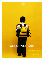 Back side of a young boy wearing a backpack, long dark pants and light shirt, over a bright yellow backdrop.